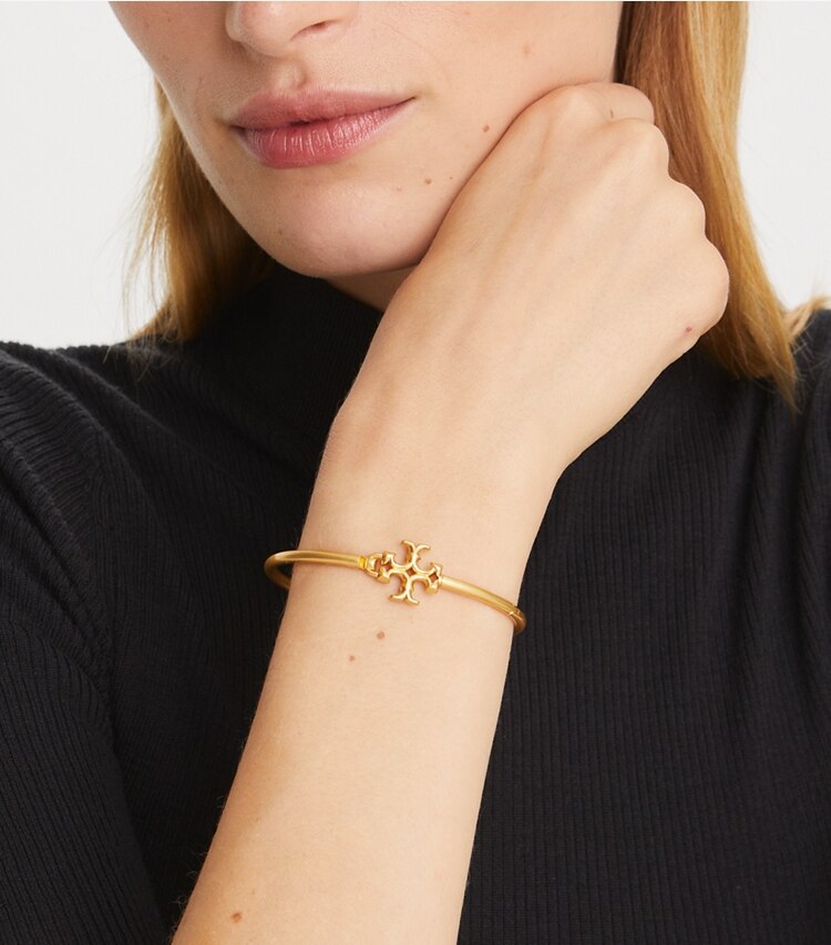 Tory Burch designer bracelets Eleanor Hinged Cuff in Tory Silver accessory on model