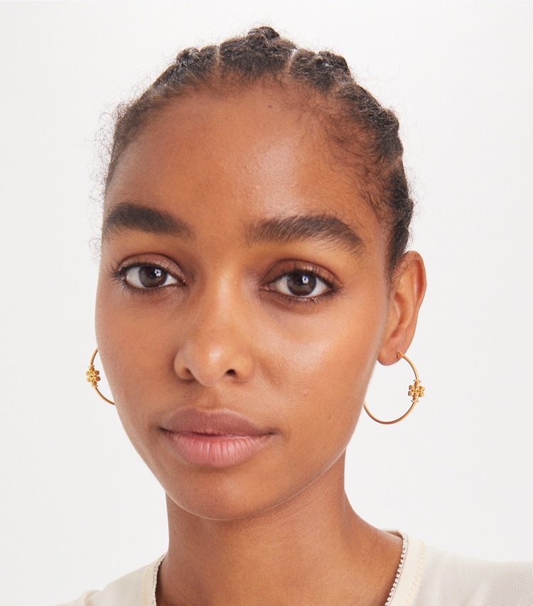 Tory Burch designer earrings Eleanor Hoop Earring in Tory Silver accessory on model