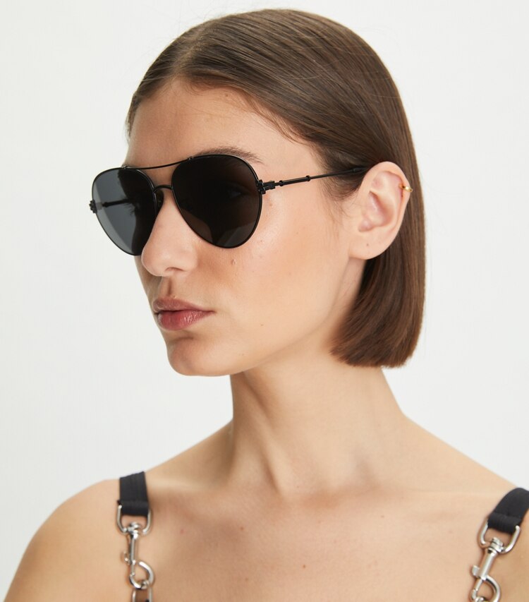 Tory Burch designer sunglasses & eyewear Eleanor Metal Pilot Sunglasses in Shiny Gold/Green Solid accessory on model