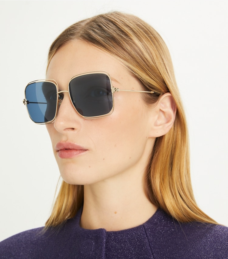 Tory Burch designer sunglasses & eyewear Eleanor Oversized Metal Square Sunglasses in SHINY LIGHT GOLD/DARK BLUE accessory on model