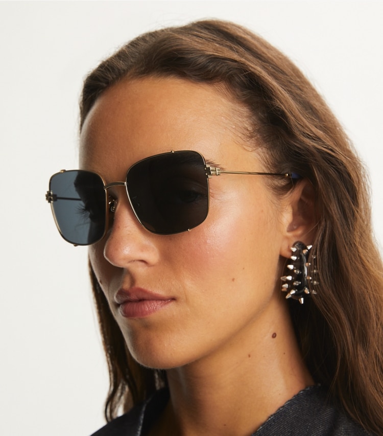 Tory Burch designer sunglasses & eyewear Eleanor Rectangle Sunglasses in SHINY LIGHT GOLD/DARK GREY accessory on model