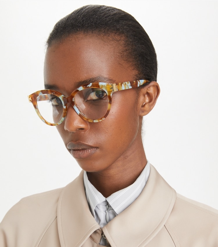 Tory Burch designer sunglasses & eyewear Eleanor Round Eyeglasses in BLUE HONEY TORTOISE accessory on model
