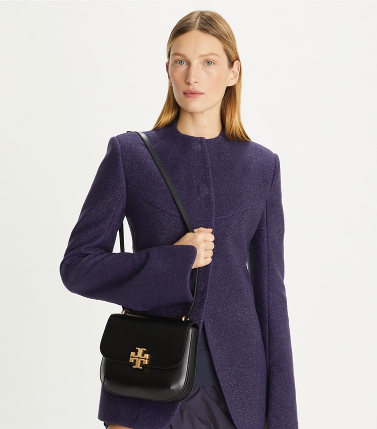 Tory Burch designer shoulder bags Eleanor Slim Saddlebag in Black accessory on model