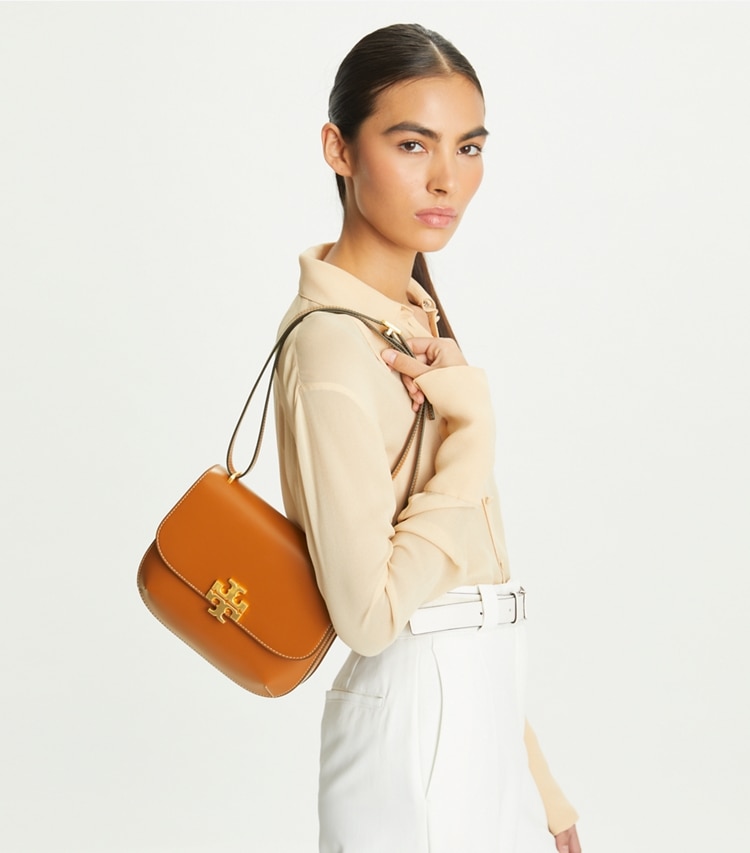 Tory Burch designer shoulder bags Eleanor Slim Saddlebag in Malt Whiskey additional on model