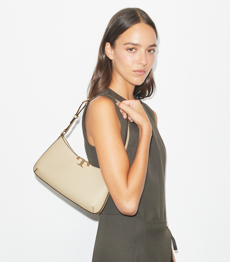 Tory Burch designer ショルダーバッグ エレノア ソフト スリム ショルダーバッグ in Light Stone accessory on model