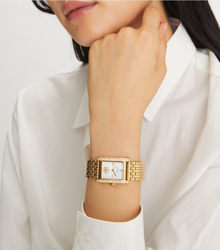 Tory Burch designer strap watches Eleanor Watch in WHITE MOP/GOLD accessory on model