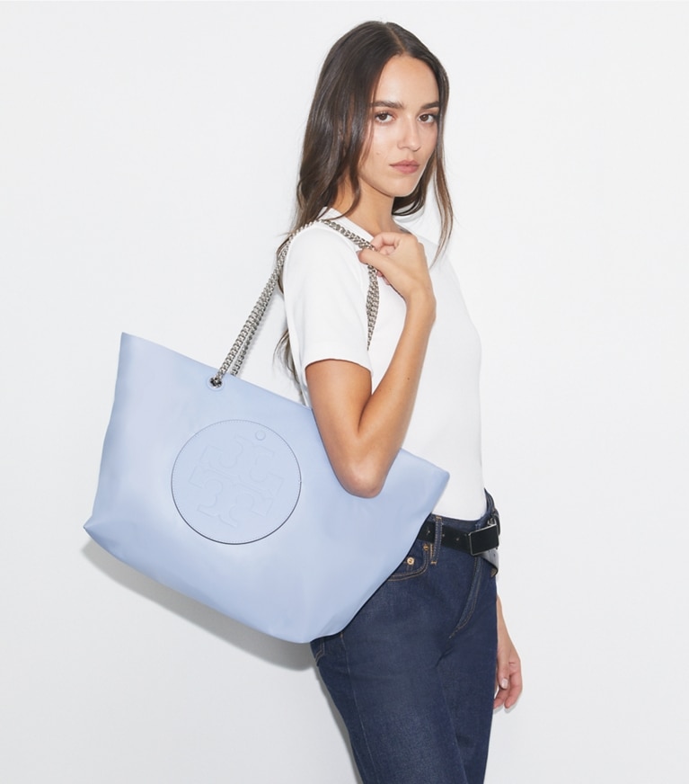 Tory Burch designer tote bags Ella Chain Zip Tote in Blue Dawn accessory on model