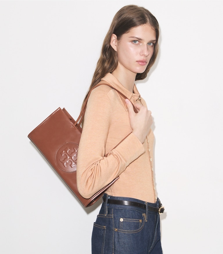 Tory Burch designer tote bags Ella East-West Tote in Aged Tan accessory on model