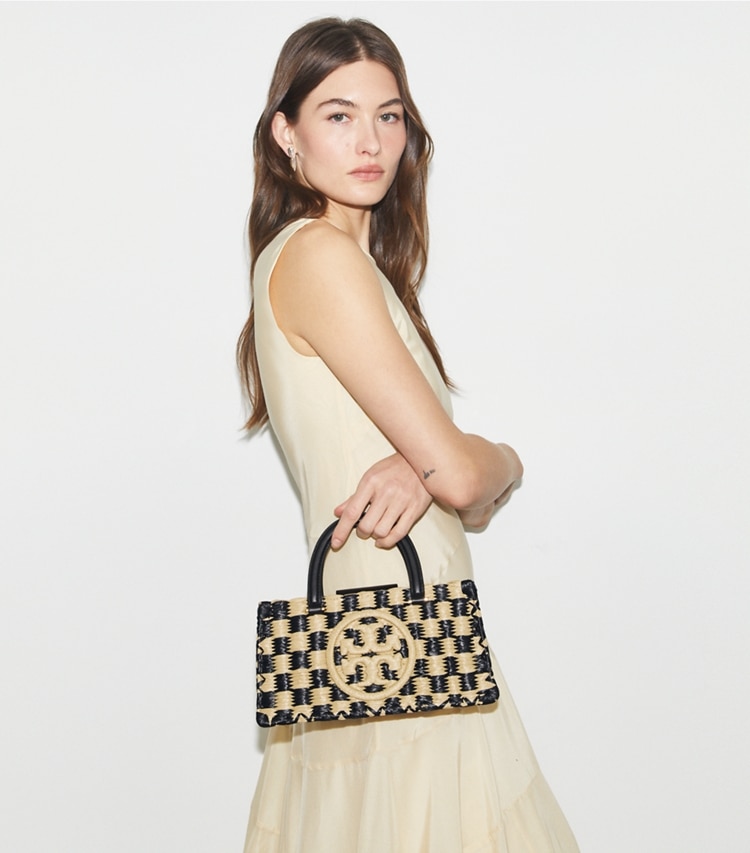 Tory Burch designer satchels Ella Hand-Crocheted East-West Tote in Black / Natural accessory on model
