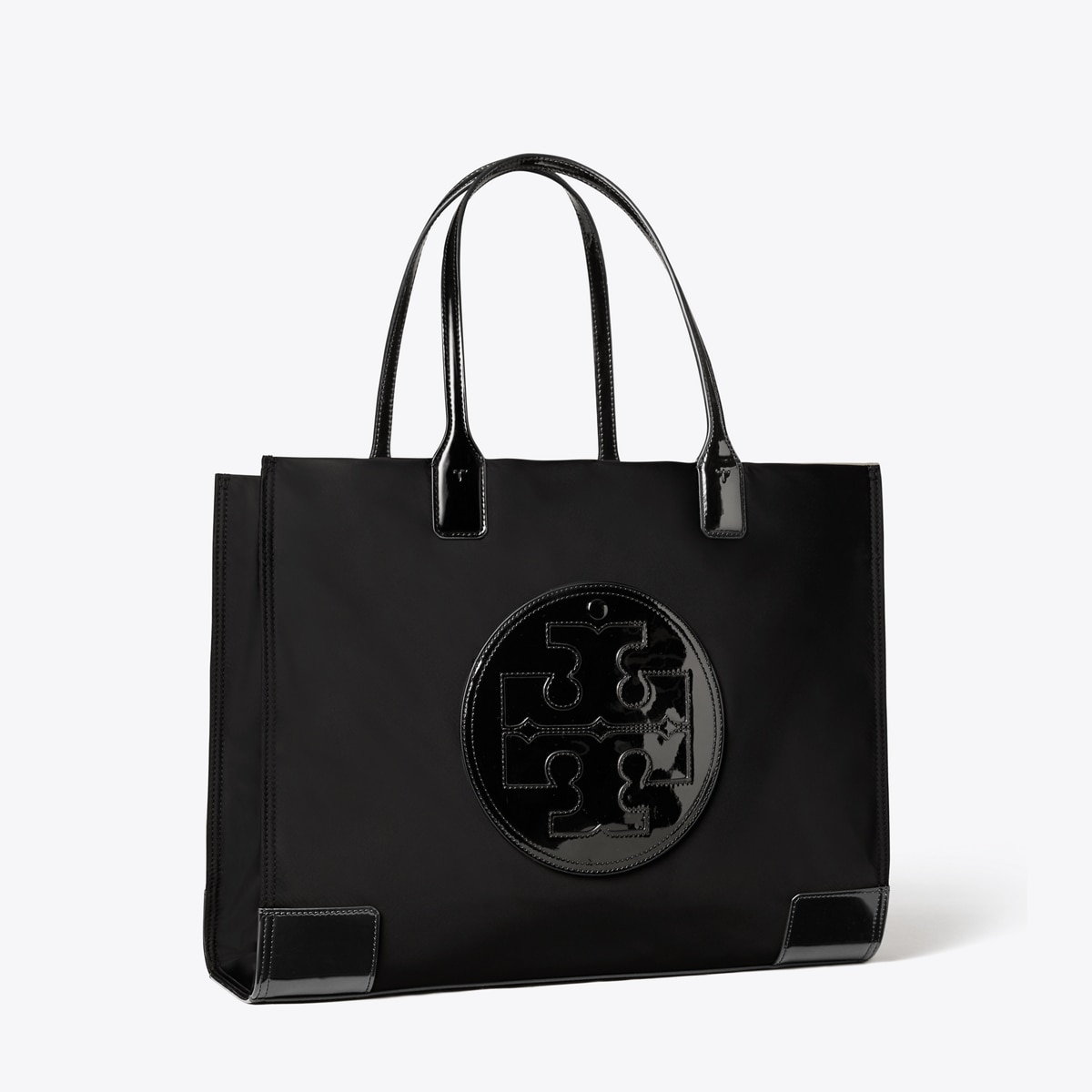 Arriba 61+ imagen tory burch black patent ella nylon tote