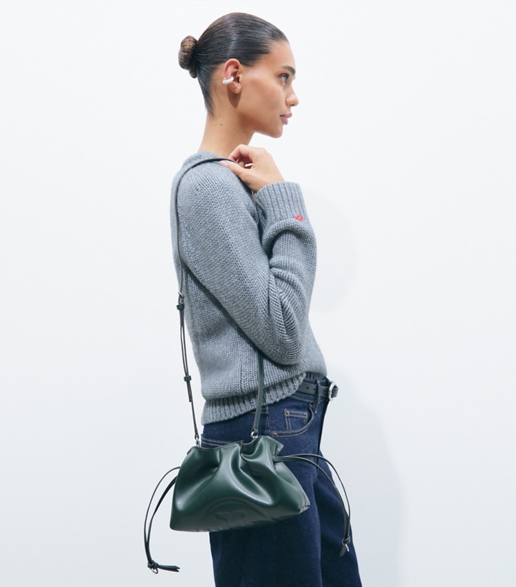 Tory Burch designer crossbody bags Ella Recycled Drawstring Pouch in Pine Tree accessory on model