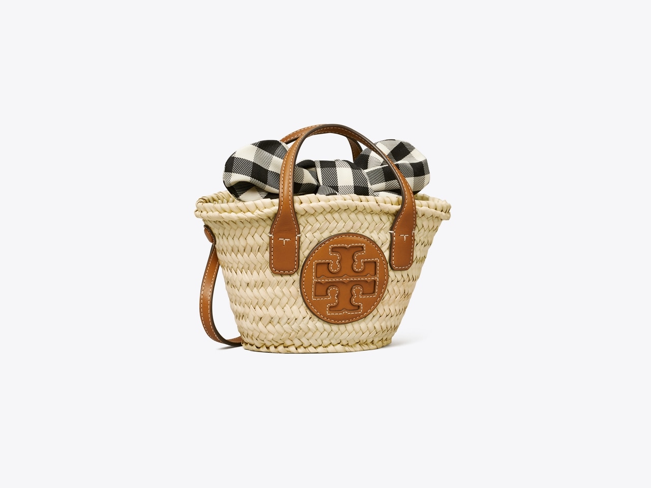Tory Burch - The Ella Straw Micro Tote. The straw was hand-woven by women  artisans from Doum For Women, a women's weaving collective in Marrakech.  Doum gives more than 200 women financial