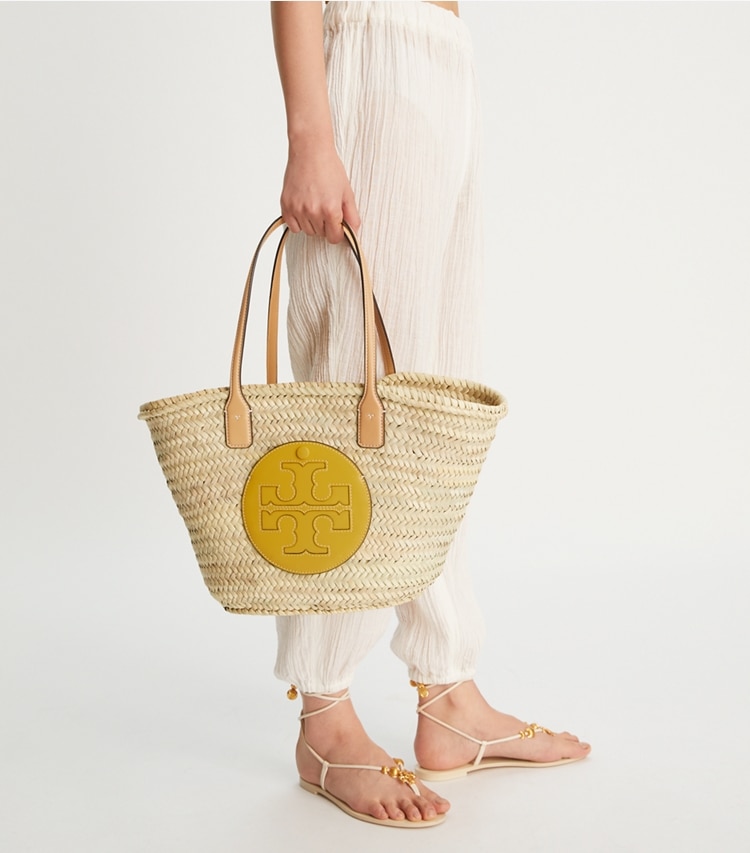 Tory Burch designer tote bags Ella Straw Basket Tote  in Natural / Golden Sunset accessory on model