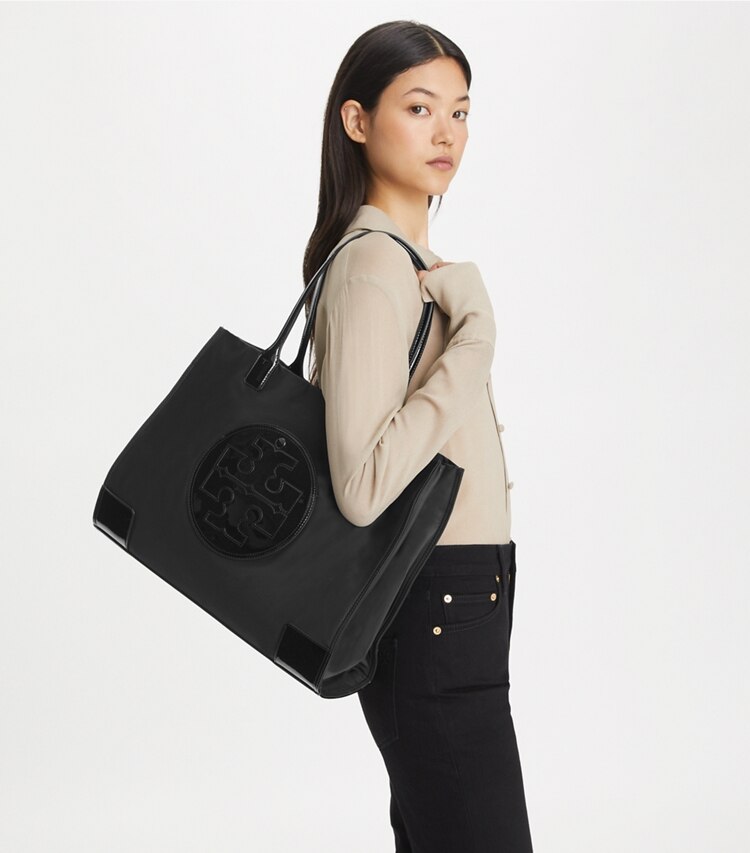 Tory Burch designer tote bags Ella Tote Bag aus Lackleder in Black accessory on model