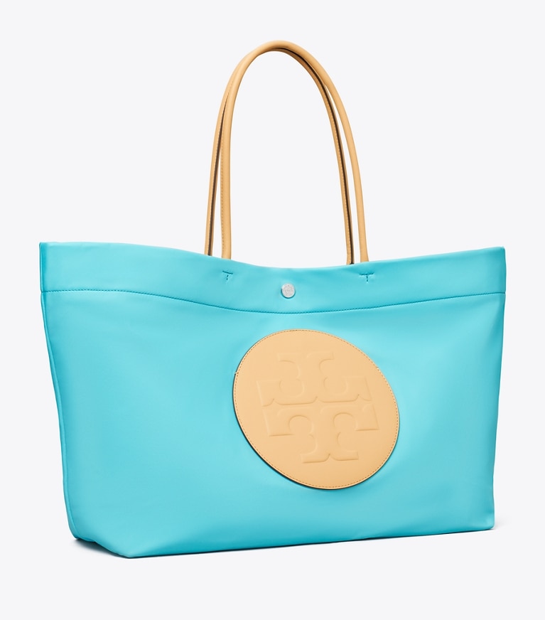 Tory Burch designer tote bags Ella Twist Reversible Tote in Soft Turquoise angle