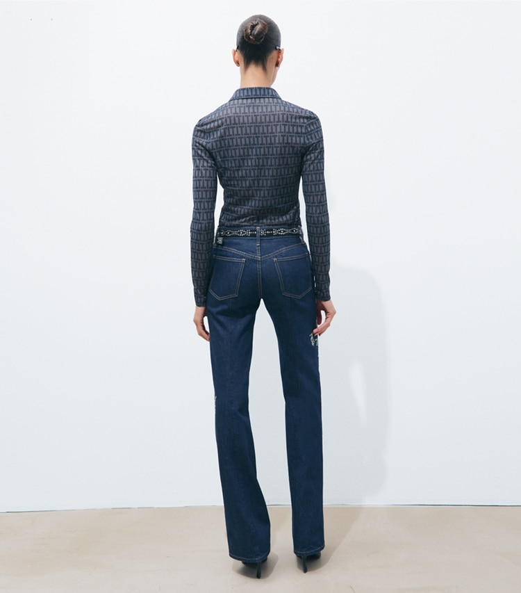 Tory Burch designer bottoms Embellished Bootcut Jean in Raw/Unwashed Vintage Selvedge Denim on model back
