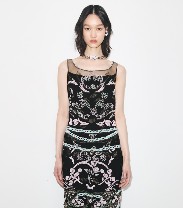 Tory Burch designer dresses Embellished Mesh Dress in BLACK on model detail