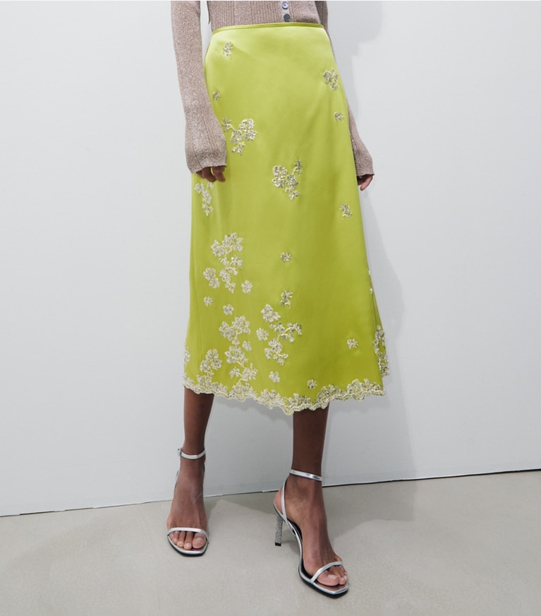 Tory Burch designer bottoms Embellished Silk Skirt in Green Citron on model detail