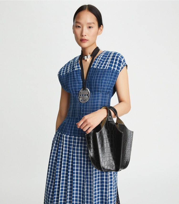 Tory Burch designer crossbody bags Embossed Lampshade Bag in Black accessory on model