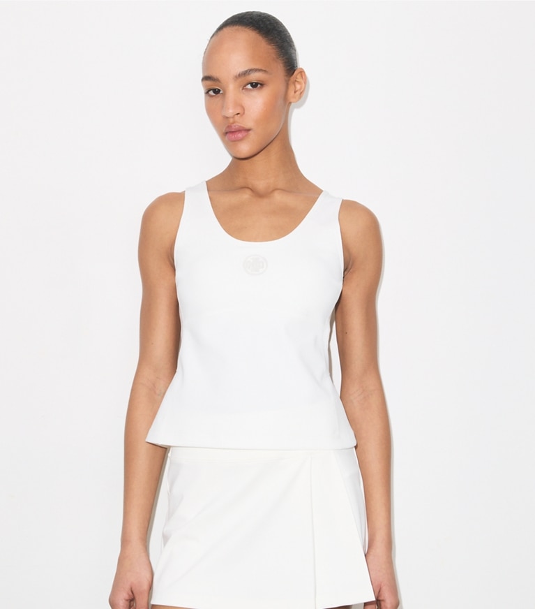 Tory Burch designer dresses Embossed Logo Tennis Tank in Snow White on model detail