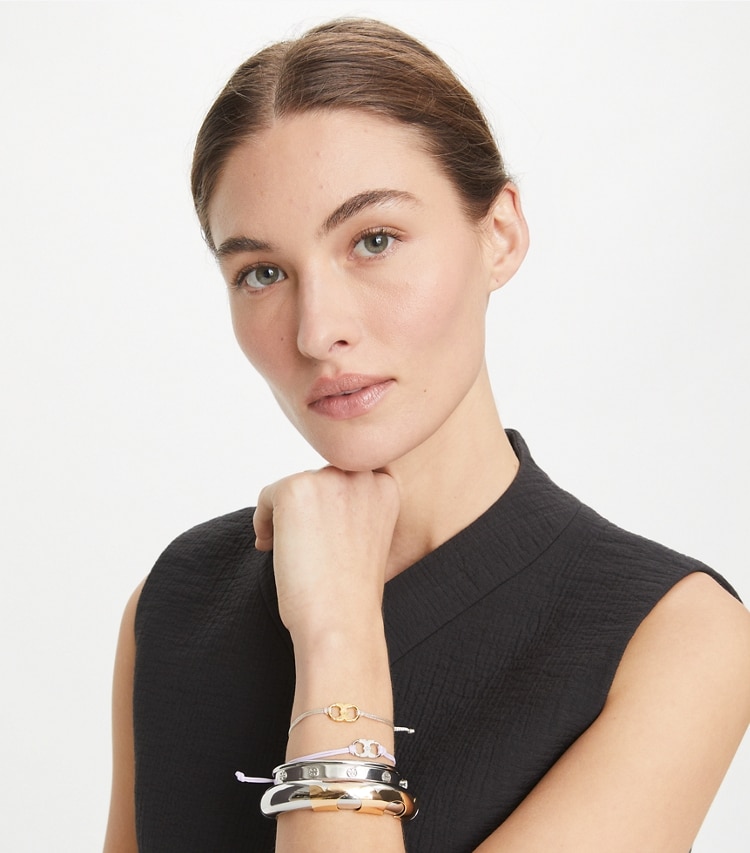 Tory Burch designer bracelets Embrace Ambition Bracelet in Tory Gold / Green accessory on model