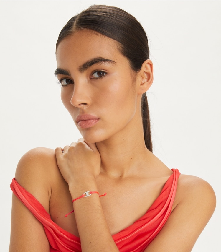 Tory Burch designer bracelets Embrace Ambition Bracelet in Light Silver / Sublime Coral accessory on model