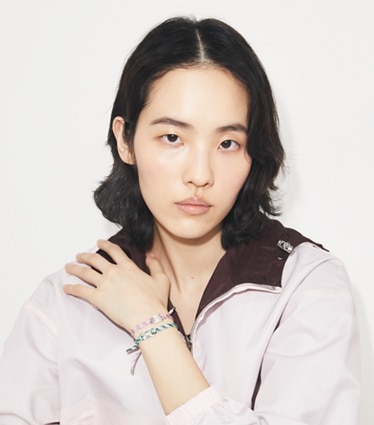 Tory Burch designer bracelets Embrace Ambition Bracelet in Rose Gold / Multi accessory on model