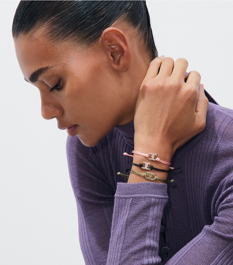 Tory Burch designer bracelets Embrace Ambition Pavé Bracelet in Green / Crystal accessory on model