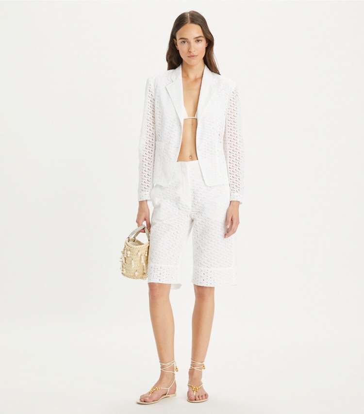 Tory Burch designer bottoms Embroidered Broderie Anglaise Bermuda Shorts in White on model front