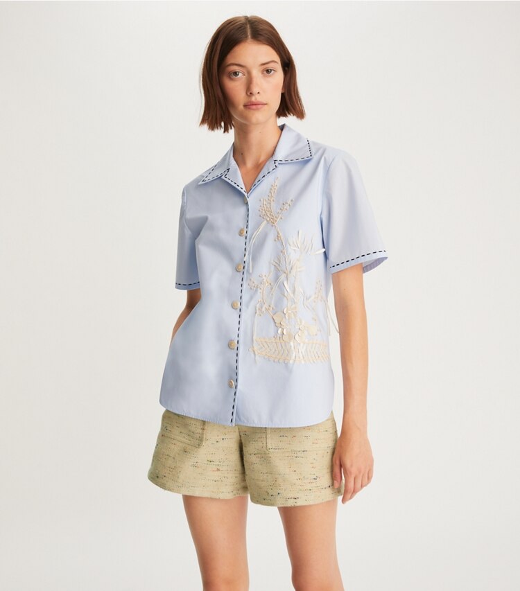Tory Burch designer tops Embroidered Camp Shirt in Crisp Blue on model detail