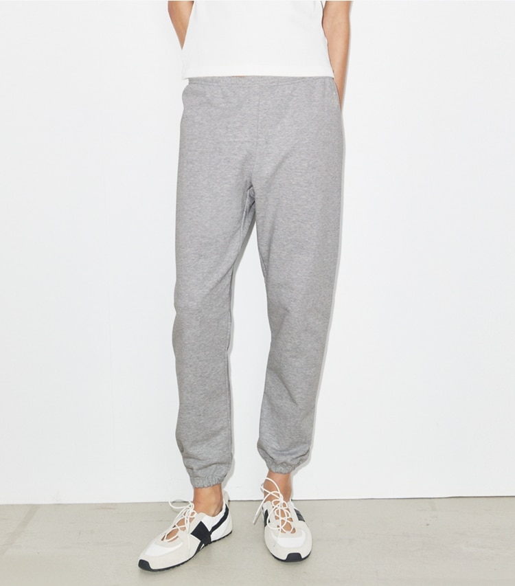 Tory Burch designer bottoms Embroidered Cotton Sweatpant in Medium Heather Gray on model detail