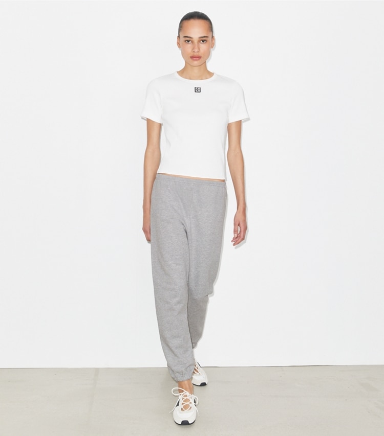 Tory Burch designer bottoms Embroidered Cotton Sweatpant in Medium Heather Gray on model front
