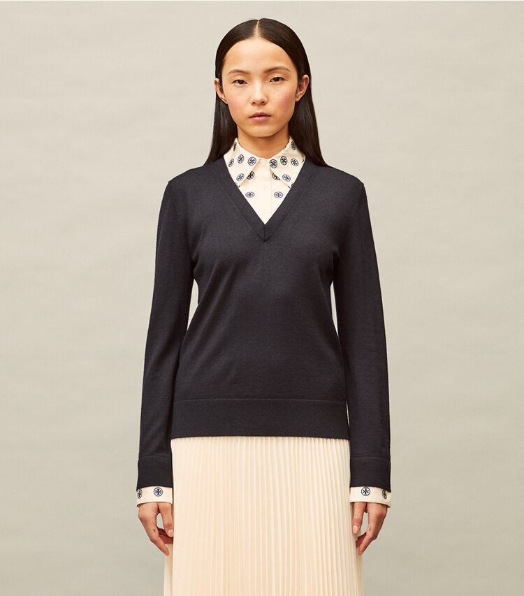 Tory Burch designer sweaters Embroidered Dickie V-Neck Sweater in Medium Navy on model detail