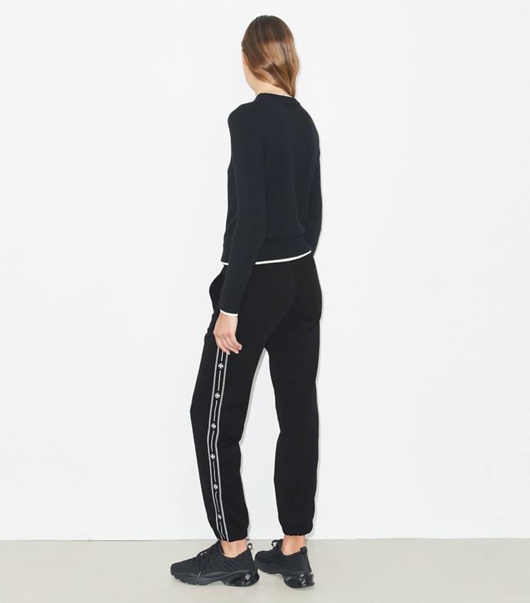 Tory Burch designer bottoms Embroidered French Terry Sweatpants in Black on model back