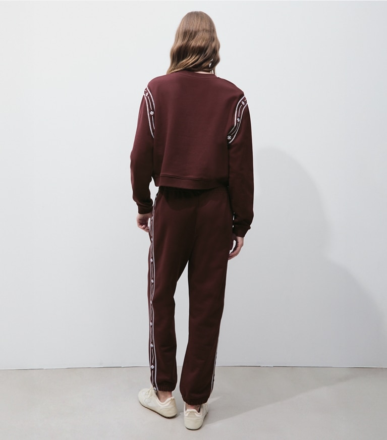 Tory Burch designer sweaters Embroidered French Terry Sweatshirt in Merlot on model back