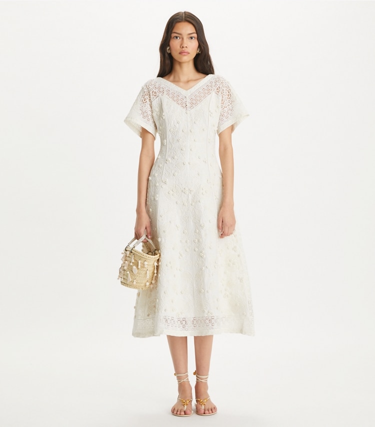 Tory Burch designer dresses Embroidered Linen Dress in Natural Ivory on model front