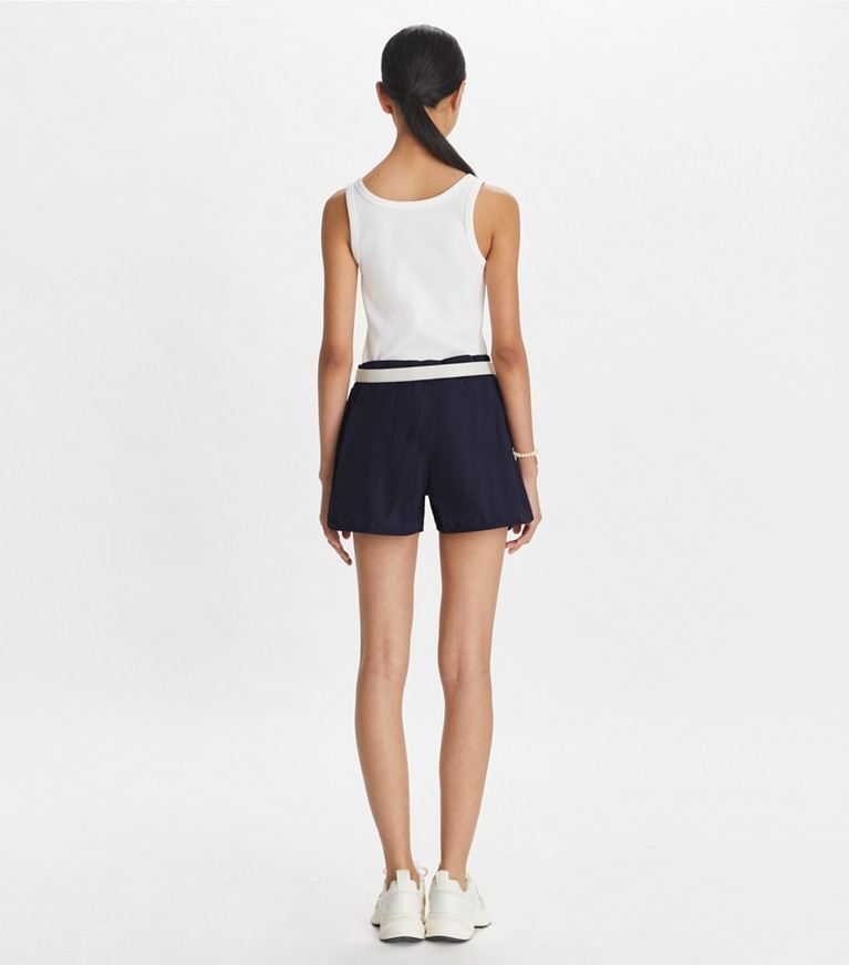 Tory Sport designer bottoms Embroidered Logo Nylon Short in Deep Navy front