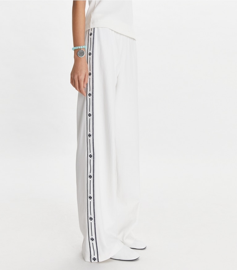 Tory Sport designer bottoms Embroidered Logo Nylon Track Pant in Snow White front