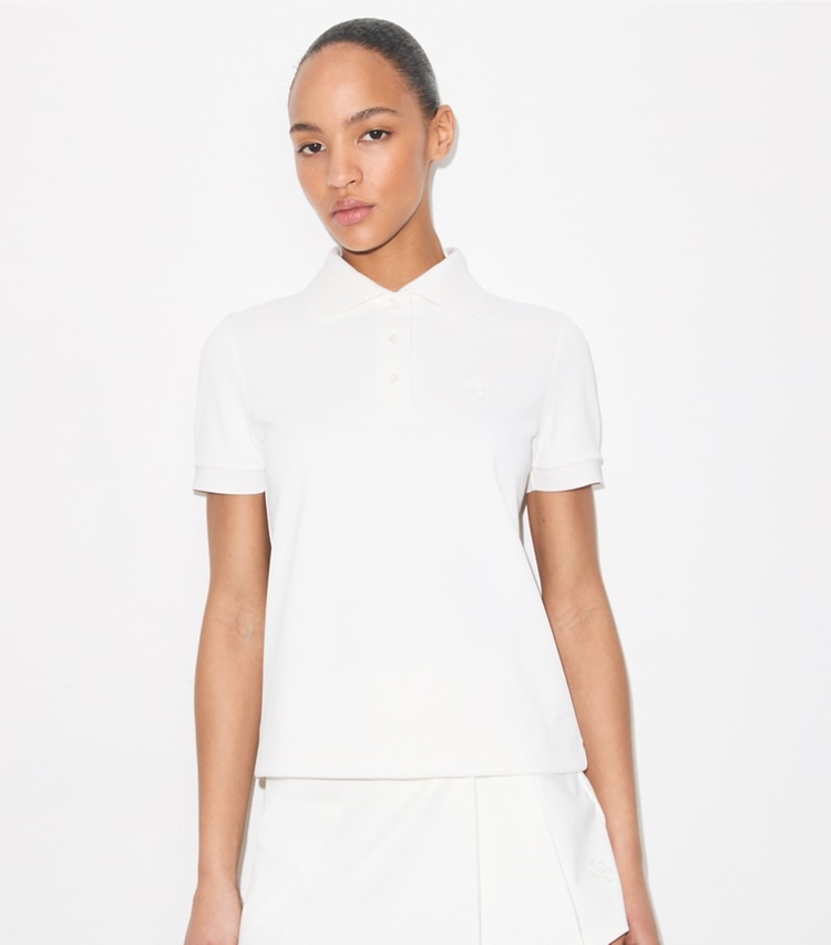 Tory Burch designer tops Embroidered Logo Tennis Polo in Snow White on model detail