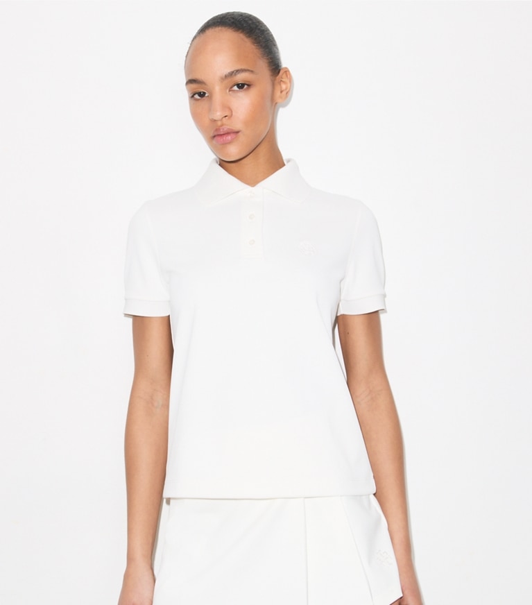 Tory Burch designer tops Embroidered Logo Tennis Polo in Snow White on model detail