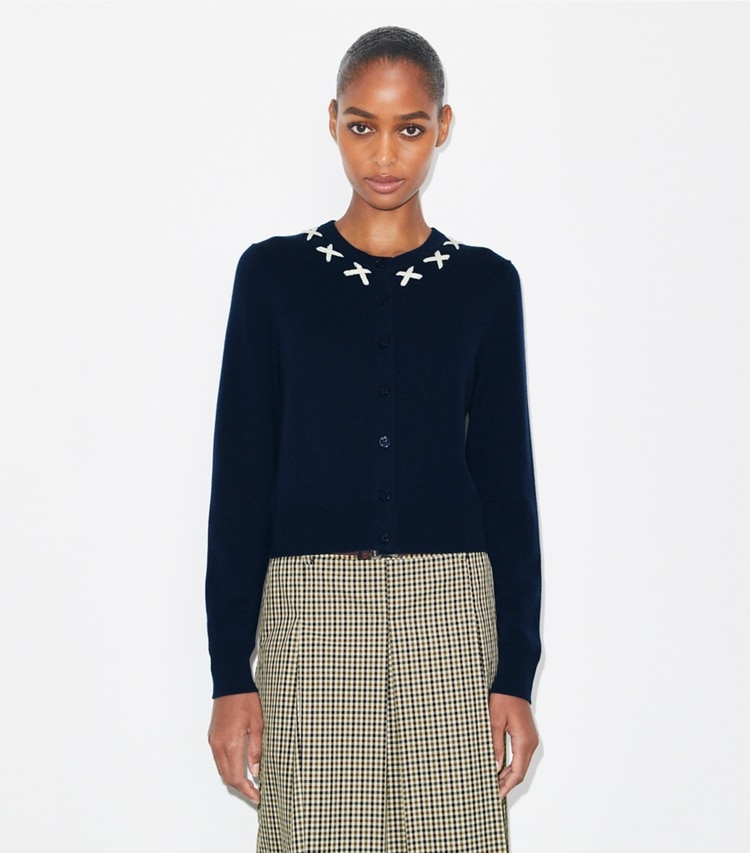 Tory Burch designer sweaters Embroidered Merino and Cashmere Cardigan in Navy / White on model detail