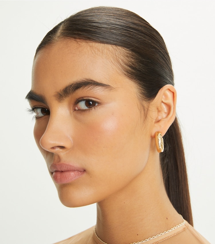Tory Burch designer earrings Essential Hoop in Tory Gold accessory on model