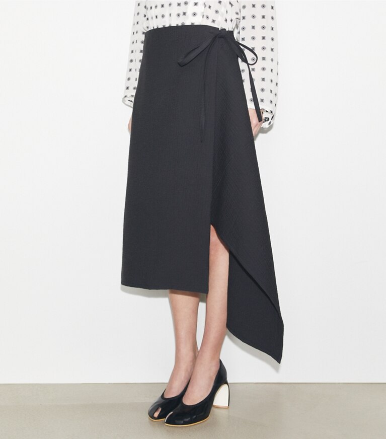 Tory Burch diseñador prendas de abajo Falda cruzada de algodón en Black detalle en modelo