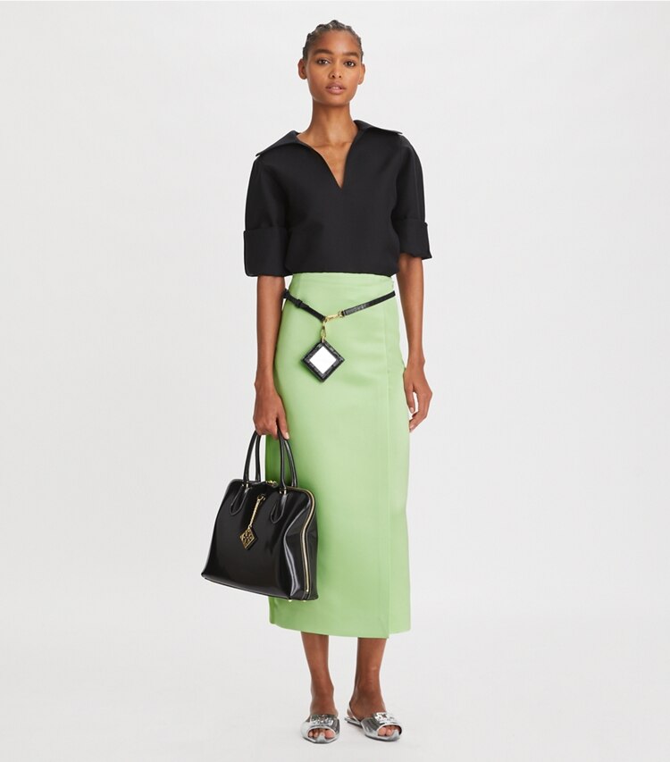 Tory Burch diseñador prendas de abajo Falda cruzada de satén en Mint frente en modelo