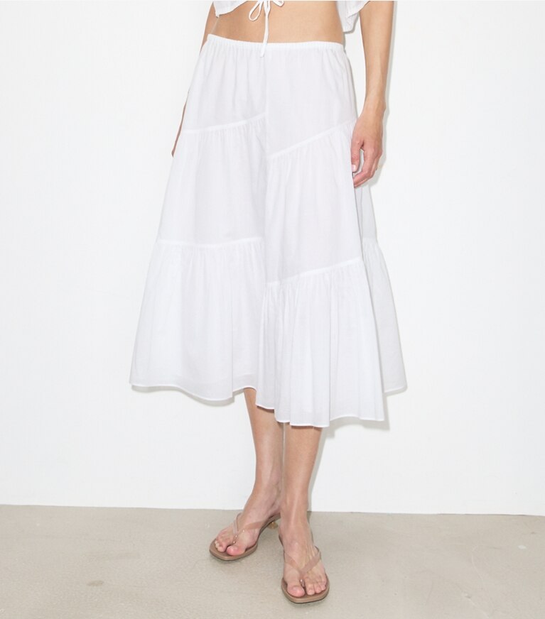 Tory Burch diseñador ropa de playa Falda de algodón en White detalle en modelo