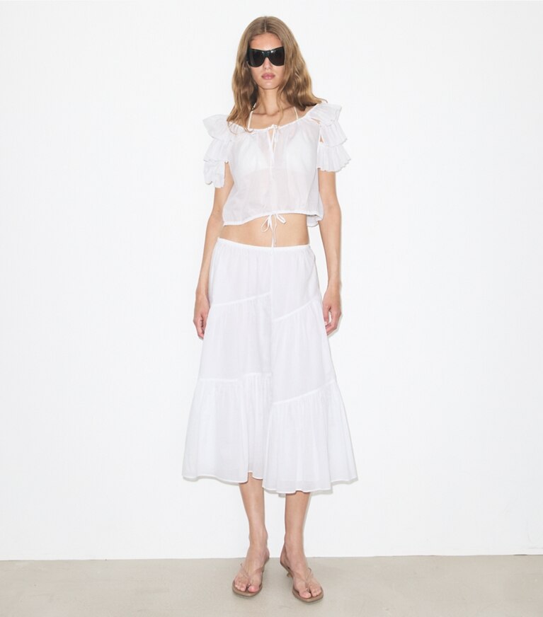 Tory Burch diseñador ropa de playa Falda de algodón en White frente en modelo