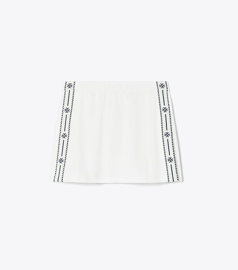 Tory Sport diseñador prendas inferiores Falda de tenis de piqué con franja de logotipo Tech en Snow White frente