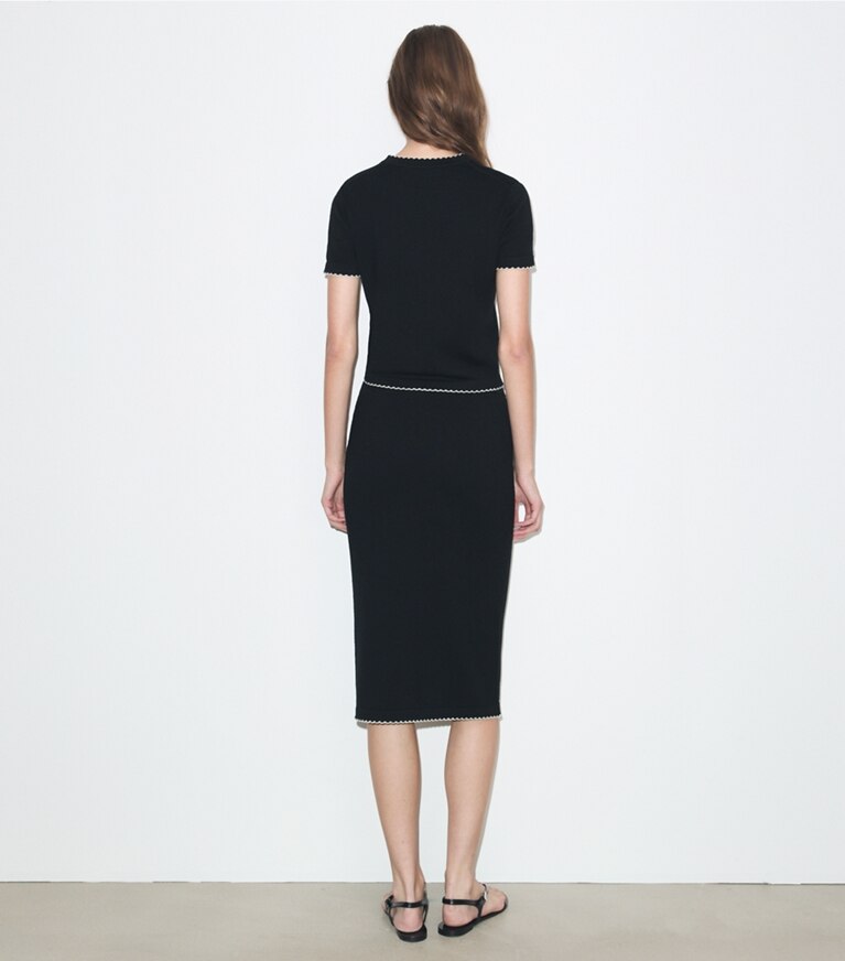 Tory Burch diseñador prendas inferiores Falda festoneada de lana en Black / New Ivory parte posterior en modelo