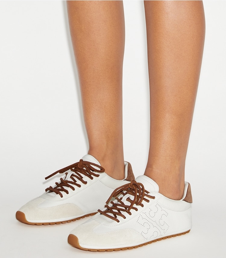Tory Burch designer sneakers Field Sneaker in BLANC / WHITE MOCHA / GINGERBREAD BROWN accessory on model