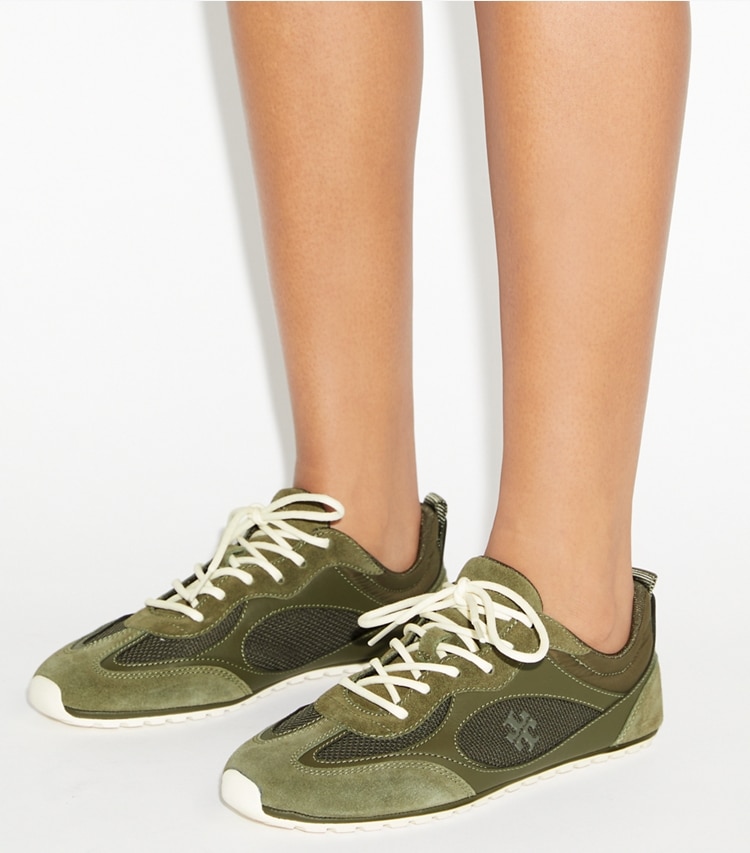 Tory Burch designer sneakers Field Sneaker in DARK OLIVE accessory on model